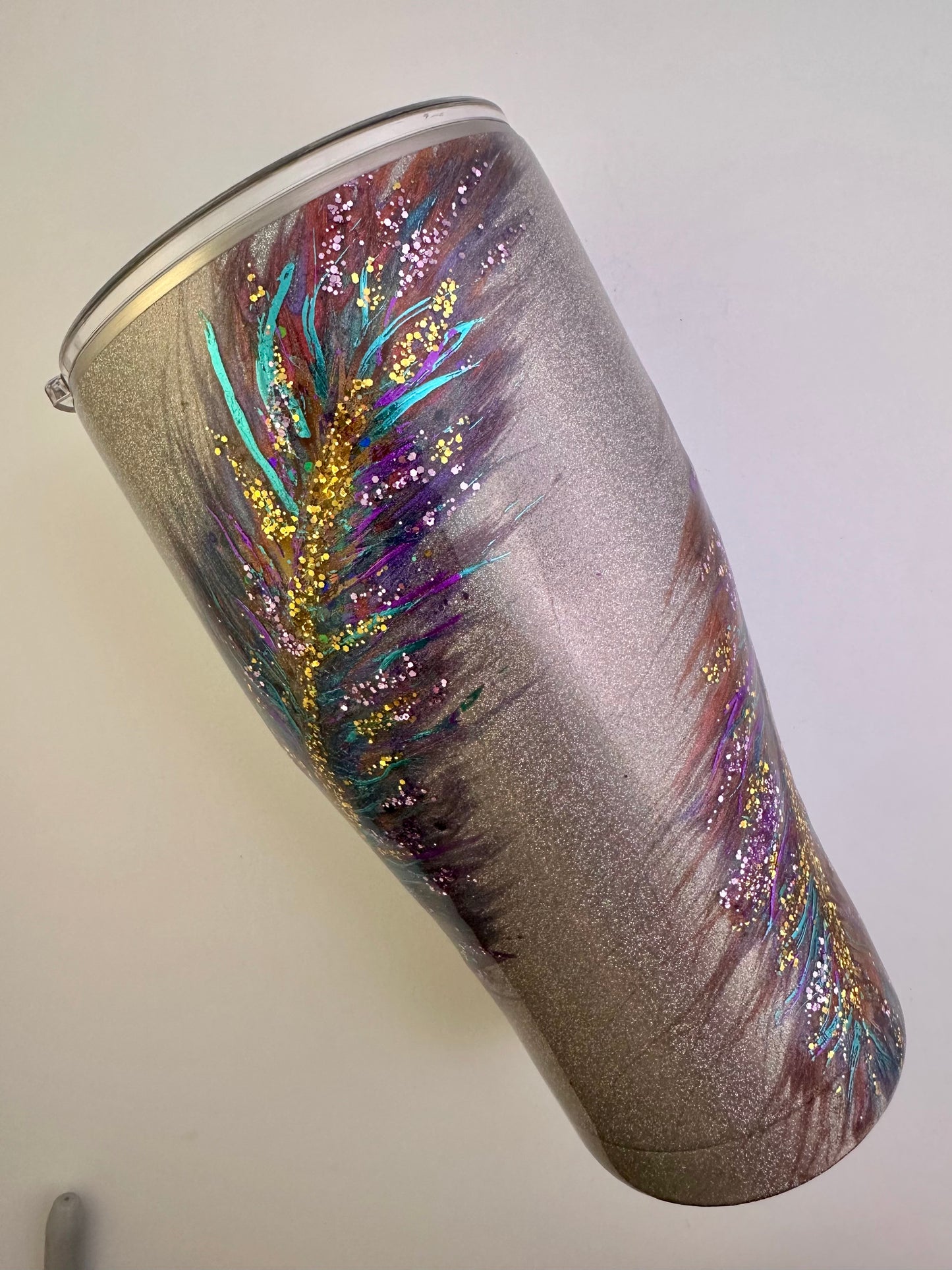 43) Feathers