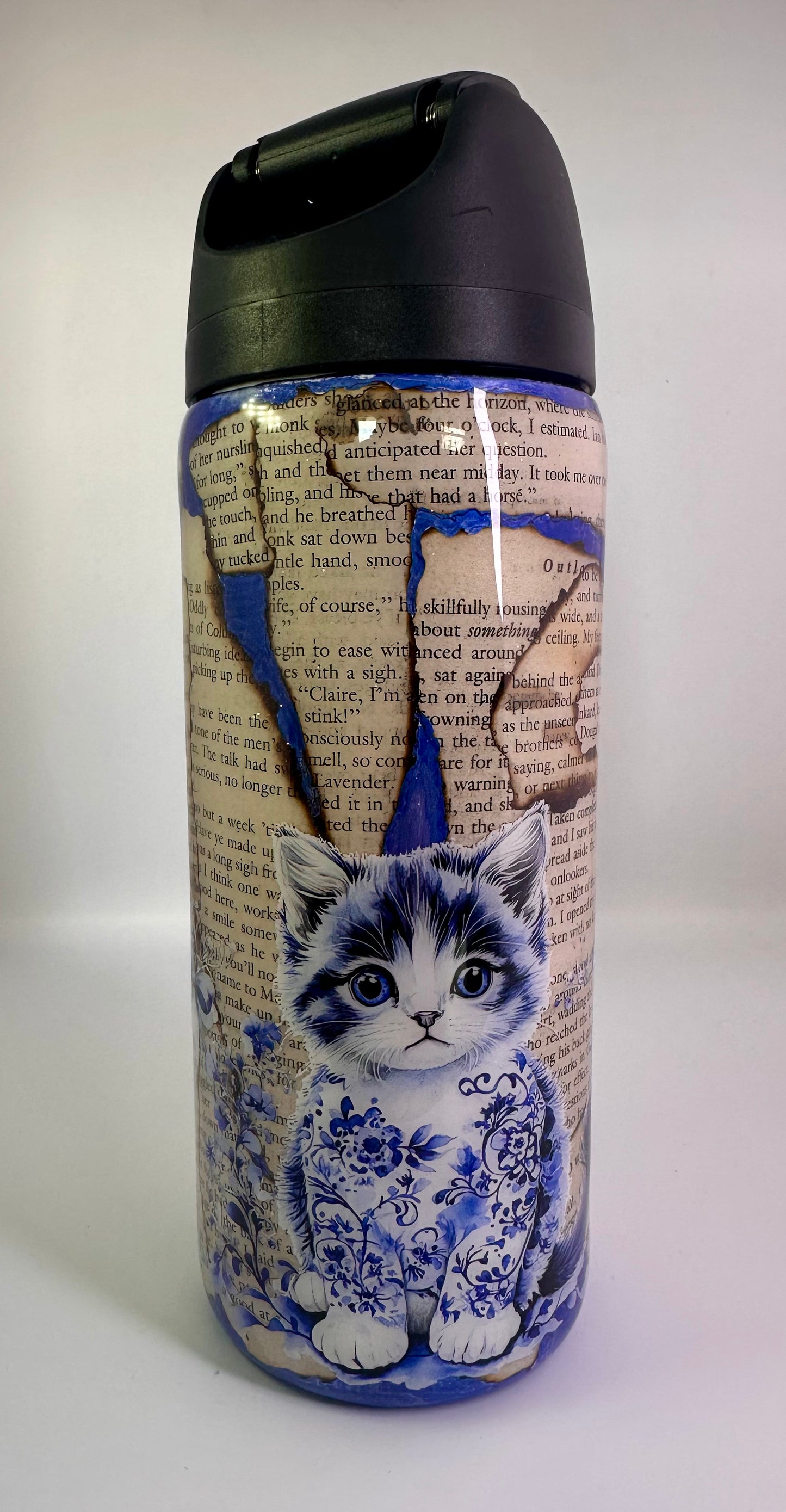 53) Porcelain Cats